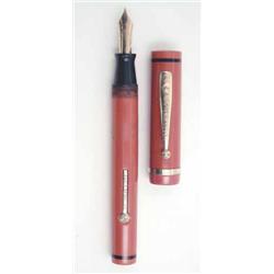 A large Eagle Pencil Company red fountain pen...