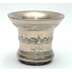An English 17th century cast bronze mortar, with a band of vine and berries to waist and a band o...