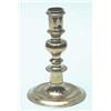 Image 1 : A French late 17th century brass candlestick, the baluster stem on circular foot with pierced eje...