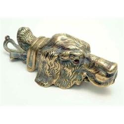 A late Victorian cast brass setter's head paper clip, with glass eyes, 6.75ins...
