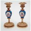 Image 1 : A pair of Sevres pattern porcelain and gilt bronze candlesticks, each porcelain knop painted with...