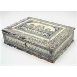 An early 19th century Vizagapatam ivory veneered box, the cover engraved with a house within foli...