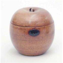 A George III fruitwood apple shaped tea caddy, with iron escutcheon and lock, the stalk replaced...