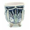 Image 1 : A Victorian majolica jardiniere, relief-moulded with birds and foliage against a deep blue ground...