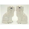 Image 1 : A pair of Victorian Staffordshire pottery 'comforter' spaniels, typical form with padlock pendant...