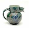 Image 1 : A C.H. Brannum, Barum jug, with fish-spout, the globular body moulded, painted and incised with a...