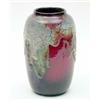 Image 1 : A Royal Doulton Chang vase, of ovoid form, decorated in drip glaze green and white, against a red...