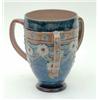 Image 1 : A Royal Doulton stoneware tyg, decorated with stylised floral raised decoration on a mottled blue...