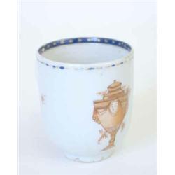 An Export coffee cup painted with an iron red urn, below a blue enamel border....