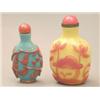 Image 1 : A brick red overlay lavender ground, glass oviform snuff bottle, with gourd sprays, 2.5ins; and a...