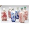 Image 1 : A red overlay snowstorm ground glass rounded rectangular snuff bottle, with equestrian figures, 2...