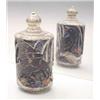 Image 1 : An ivory polychrome table snuff bottle, carved in high relief with two birds among flowering bran...