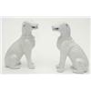 Image 1 : A pair of 18th century Chinese blanc de chine hound models, open-mouthed, seated on hind legs, ri...