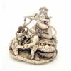 Image 1 : An ivory netsuke, Meiji, three mythological characters and shishi, signed, 2ins...
