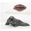 Image 1 : A carved coquilla model of a boat, 1.5ins and a bronze crawling figure, 2.5ins...