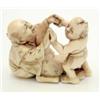 Image 1 : An ivory netsuke, Meiji, father and son at play, father wearing engraved kimono, signed, 1.25ins...