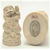 Image 1 : An ivory okimono, Meiji, man holding mouse, his kimono engraved with Buddhistic emblems, signed 3...