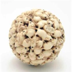 A fine spherical ivory study of mice, Meiji, a multiplicity of mice scrambled tightly together in...