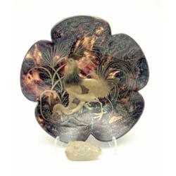 A celadon jade carving of a wild cat, 1.75ins and a lobed tortoiseshell dish gold lacquered with...