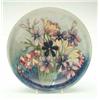 Image 1 : A Moorcroft bowl, painted with Orchids and Spring Flowers in bright enamels, circa 1930, painted...