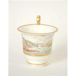 An early 19th century bone china cup, finely painted with merchant ships and smaller boats on Dar...