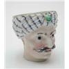Image 1 : A German porcelain bust of a Turk, turban with jewel clasp, painted crossed swords mark, (wear to...