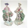 Image 1 : A pair of Chelsea porcelain figures, gentleman with basket of fruit, lady with flowers, on scroll...