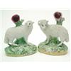 Image 1 : A Pair of Victorian Staffordshire pottery ram and sheep, spill vases, on oval moulded cushion bas...