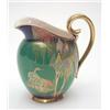 Image 1 : A Carltonware jug, enamelled and gilded with the Crane and Willow pattern against a lime-green gr...