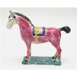 An early 19th century Pearlware Yorkshire or Scottish show horse pink sponged with yellow and blu...