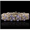 Image 1 : 14KT Yellow Gold 24.17ctw Tanzanite and Diamond Bracelet
