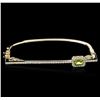 Image 1 : 14KT Yellow Gold 0.69ct Peridot and Diamond Bracelet