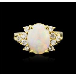 18KT Yellow Gold 1.10ct Opal and Diamond Ring