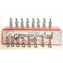 Britains Grenadier and Scots Guards, set 312 Grenadier Guards in winter overcoats, eight includin...