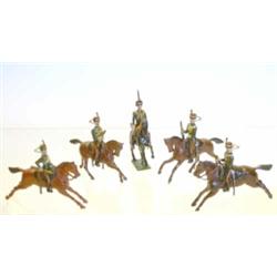 Britains set 83 Middlesex Yeomanry, two troopers on one-eared rocking horses dated 1901, two troo...