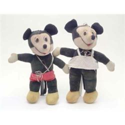Mickey and Minnie Mouse, post-war, in black and white felt with costume, (13.5 ins - fair)...