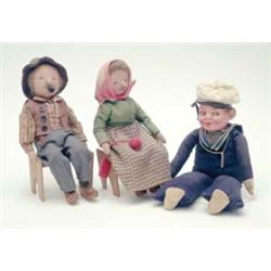 A pair of seated cloth figures, Grandpa with hat and pipe, Grandma wearing scarf (9ins) together...