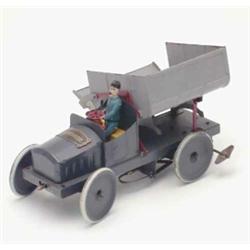 A Victor Bonnet & Cie tinplate and clockwork side-tipping wagon, French, circa 1920, lithographed...