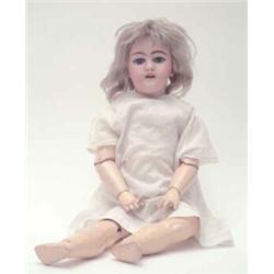 A German bisque doll, impressed mark DEP., with sleeping eyes, open mouth and jointed composition...