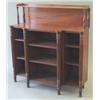 Image 1 : A Regency mahogany breakfront dwarf bookcase with raised shelf on turned columns over an arrangem...