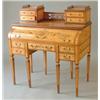 Image 1 : An early 20th century satinwood desk with raised superstructure of drawers separated by a fret wo...
