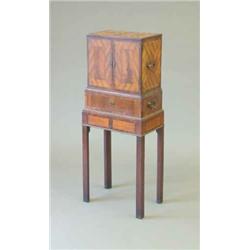 A George III laburnum and cocus wood collectors cabinet, with gilt brass side handles and two doo...