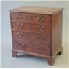 Image 1 : A small George III mahogany chest of four graduated drawers fitted brushing slide on bracket feet...