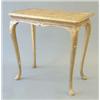 Image 1 : A George I giltwood side table with relief moulded scrolling decoration to the top, over a concav...