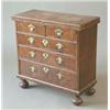 Image 1 : A walnut and feather banded bachelor's chest of Queen Anne design, with fold over top revealing g...