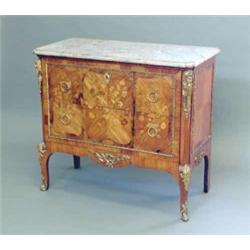 A 19th Century French ormolu mounted kingwood and marquetry commode, with variegated red and grey...