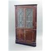 Image 1 : A George III mahogany standing corner cabinet, with dentil cornice and two astragal glazed doors...