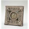 Image 1 : An Ansonia strut clock, with small printed paper dial, in silvered metal and mirrored frame, pate...