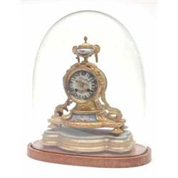 A late 19th century French ormolu mantel clock, with Sevres-style dial and inset plaque, movement...