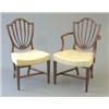 Image 1 : A fine set of 12 Hepplewhite period mahogany shield back dining chairs (including two with arms),...